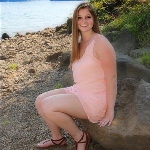 Pink romper with crossed back💘